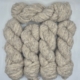 Écheveaux de laine Thèbes Volupté en bébé alpaga et coton Pima, coloris naturel gris chiné